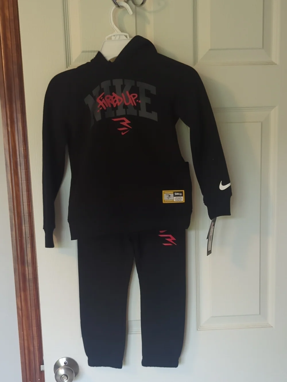 Nike Black Kids Hoodie and Jogger Set with Red Accents